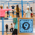 Large, blue, square poly-spot with nine different exercises. Variety of students performing arm circles and jogging in place. Having fun while being active and healthy. 